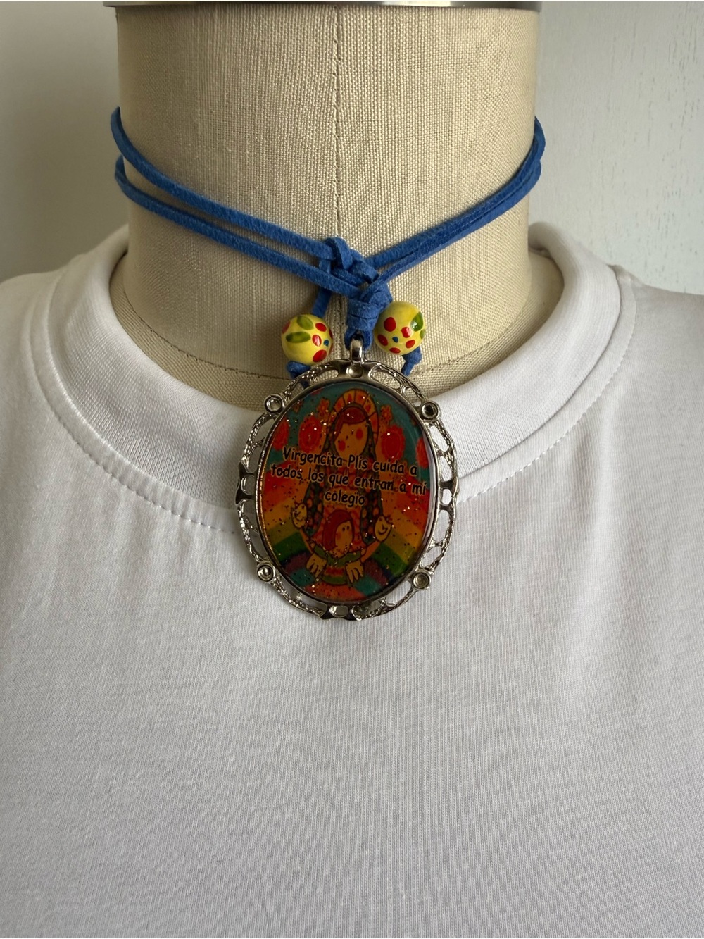 Blue Cord Pendant Necklace with Colorful Religious Medallion